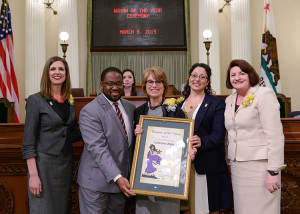 Assemblymember Sebastian Ridley-Thomas honors Cathy Younger, to his immediate left. Photo, Assembly Democratic Caucus