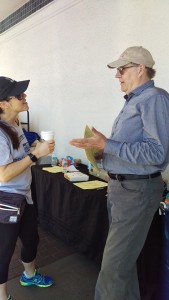 City Council candidate Göran Eriksson visits with Megan Rawls.