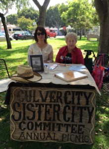 Grace Reitzfeld, left, and Joyce Perlick staff the Sister City Registration Table.